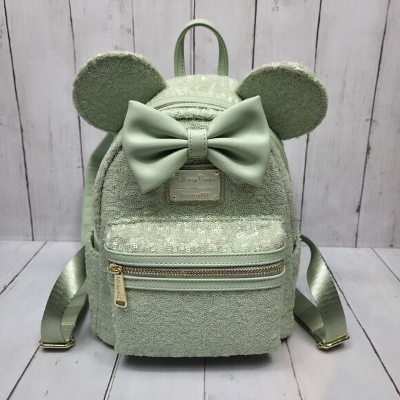 Loungefly Handbags - Disney Parks Loungefly Mint Green Sequin W Bow Mini Backpack Retired Rare Cute!